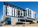 Modern building exterior with clean lines, multiple windows, and detailed architecture at 523 S West St # 409, Raleigh, NC 27601