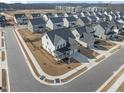 An elevated view shows a pristine neighborhood with well-maintained homes and landscaping at 652 Marion Hills Way, Knightdale, NC 27545