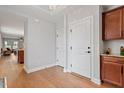 Bright foyer featuring hardwood floors, neutral walls, and convenient access to the kitchen and living areas at 1003 Branwell Dr, Durham, NC 27703