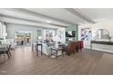 Bright, open living room with hardwood floors, modern furniture, and a sliding glass door to the outside at 1237 S Blount Street # 201, Raleigh, NC 27601