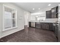 Spacious kitchen featuring a large window and stainless steel appliances at 124 Currituck Ln, Durham, NC 27703