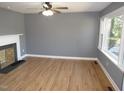 Spacious living room featuring hardwood floors and a fireplace at 136 Dogwood Trl, Wendell, NC 27591