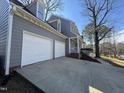 Spacious two-car garage attached to a well-maintained two-story home at 208 Lawrence Rd, Cary, NC 27511