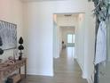 Bright entryway showcasing light wood floors and neutral paint creates a welcoming atmosphere at 244 Bevis Marks Dr, Fuquay Varina, NC 27526