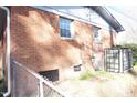 Brick exterior with a glimpse of the AC unit at 2918 Kanewood Dr, Durham, NC 27707