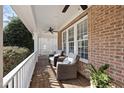 Relaxing front porch featuring comfortable seating, perfect for enjoying the outdoors at 3604 Heritage Creek Dr, Apex, NC 27539