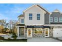 Beautiful two-story home showcases mixed siding, an attached two car garage and manicured landscaping at 602 Andrade Dr, Fuquay Varina, NC 27526