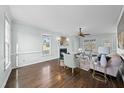 Bright living room with fireplace, hardwood floors and plush seating arrangement at 126 Claire Dr, Clayton, NC 27520