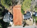 Aerial view of lot showcasing ideal location and proximity to surrounding homes at 2709 Rothgeb Dr, Raleigh, NC 27609