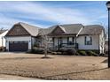 Charming single-story home with an attached two-car garage and manicured front yard at 30 Imperial Dr, Clayton, NC 27527