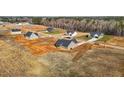 Aerial view of new homes in a developing neighborhood at 9315 Turkey Way, Middlesex, NC 27557