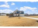 Two-story home with attached two-car garage on large lot in quiet neighborhood at 171 Piney Field Rd, Fuquay Varina, NC 27526