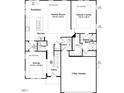 Detailed first-floor plan showcasing the layout with the kitchen, owner's suite, dining, and garage at 1016 Channel Drop Lp, Zebulon, NC 27597