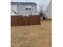 Large fenced-in backyard offering privacy and space for outdoor activities at 1304 Cozart St # 414, Durham, NC 27704