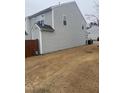 Spacious side yard with a privacy fence and vinyl siding at 1304 Cozart St # 414, Durham, NC 27704