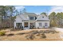Stunning single-Gathering home showcasing impeccable landscaping and timeless design at 2412 Toll Mill Ct, Raleigh, NC 27606