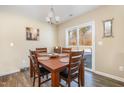 Cozy dining area bathed in natural light, offering a warm atmosphere for Gathering meals and entertaining at 310 Mineral Spring Ln, Fuquay Varina, NC 27526