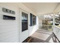 Close-up of the welcoming front door on the front porch with a 