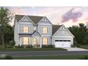 Charming two-story home with light blue siding, a two-car garage, and well-manicured front lawn at 1204 Opal Ln # 93, Durham, NC 27705