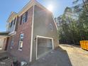 Attached two car garage with automatic door at 1849 Ballard Rd # Holly Georgian, Fuquay Varina, NC 27526