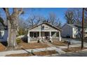 Cozy home with a classic front porch, offering a glimpse of neighborhood charm and tranquility at 306 N Driver St, Durham, NC 27703