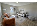 Bright living room with hardwood floors, modern furniture, and plenty of natural light at 1304 S 14Th St, Lillington, NC 27546