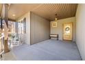 Inviting front porch area with rocking chairs, bench, and view to front yard at 193 Jenny Ln, Timberlake, NC 27583