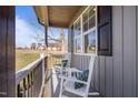 Relaxing front porch with rocking chairs to watch the world go by at 193 Jenny Ln, Timberlake, NC 27583