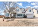 Beautiful two-story home featuring neutral siding, green shutters, and a well-maintained lawn in a suburban neighborhood at 32 Colson Dr, Garner, NC 27529