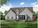Craftsman-style home boasts a beautiful lawn and stone accents at 60 Valebrook Ct, Youngsville, NC 27596