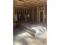 Unfinished room with framed walls ready for drywall installation at 60 Valebrook Ct, Youngsville, NC 27596