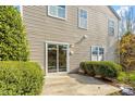 This house has a patio and a sliding glass door at 904 Churchill Glen Blvd, Knightdale, NC 27545