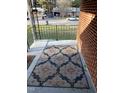 Outdoor rug on the front porch of brick home at 103 W Thorndale Dr, Oxford, NC 27565