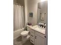 Bright bathroom with a shower-tub combo and vanity at 1216 Blue Mist Ct, Apex, NC 27502