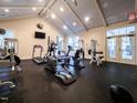 A fully-equipped fitness center offers a variety of machines and equipment for a complete workout at 1800 Pierre Pl, Apex, NC 27502