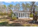 View of sunroom with white trim and many windows at 35 Rogerson Dr, Chapel Hill, NC 27517