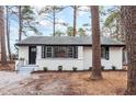 Inviting home exterior with manicured lawn and charming entry and walkway to the front door at 1804 Beverly Rd, Rocky Mount, NC 27801