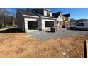 New construction home featuring a two-car garage and classic architectural details at 2328 Eagle Shot Ct # 18, Fuquay Varina, NC 27526