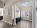 Bright and spacious foyer with high ceilings and hardwood floors, leading into the home at 405 Joseph Alexander Dr, Fuquay Varina, NC 27526