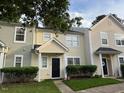 Charming townhomes featuring well-maintained landscaping and welcoming entrances at 5264 Patuxent Dr, Raleigh, NC 27616