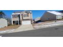 Charming two-story home with stone accents, attached two-car garage, and landscaped yard at 2725 Spring Valley Dr, Creedmoor, NC 27522