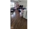 A cozy living room with hardwood floors, natural light, and comfortable seating at 2725 Spring Valley Dr, Creedmoor, NC 27522