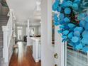 Inviting home foyer with hardwood floors and an open view into the living area at 916 Highgrove Dr, Chapel Hill, NC 27516