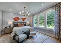 Comfortable main bedroom with large windows providing views of the outdoors at 0 High Rock Rd, Efland, NC 27243