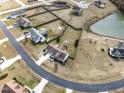 Spacious suburban home with a large backyard and a serene pond view, located in a friendly neighborhood at 47 London Ln, Angier, NC 27501