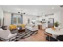 Inviting living room with a modern design, connecting seamlessly to the kitchen and dining area at 917 Montague Ave, Durham, NC 27703