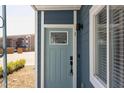 Inviting front door with decorative glass and modern hardware, leading into a cozy apartment at 1309 Hudson Ave # A1, Durham, NC 27705