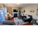 Inviting living room with fireplace and hardwood floors at 508 Stapleford Ln, Fuquay Varina, NC 27526