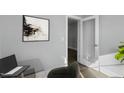 Office space featuring modern art and a doorway, creating a bright and functional work environment at 54 Merle Dr, Wendell, NC 27591