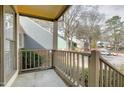 A serene porch with a view of the community, offering a relaxing spot to enjoy the outdoors at 18 Kings Mount Ct, Durham, NC 27713